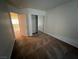 This bedroom boasts mirrored closet doors and access to an adjacent room at 8704 Autumn Wreath Ave, Las Vegas, NV 89129