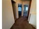 Upstairs hallway with carpet flooring, access to bedrooms, and a linen closet at 8704 Autumn Wreath Ave, Las Vegas, NV 89129