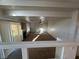 Spacious living room featuring a fireplace, ceiling fan, and ample natural light from large windows at 8704 Autumn Wreath Ave, Las Vegas, NV 89129