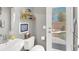 Cozy half-bathroom with stylish decorations and a view of the backyard at 9408 Ironsend St, Las Vegas, NV 89143
