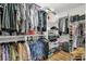 Walk-in closet with ample shelving, hanging space, and organization at 9408 Ironsend St, Las Vegas, NV 89143