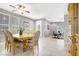 Formal dining room with large windows and classic furniture at 9408 Ironsend St, Las Vegas, NV 89143