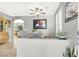 Bright and airy dining room featuring tile flooring and views of the entryway at 9408 Ironsend St, Las Vegas, NV 89143