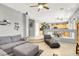 Open floor plan showcasing the living room and kitchen, perfect for entertaining at 9408 Ironsend St, Las Vegas, NV 89143