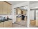 Office space featuring a mirrored closet, built-in desk and cabinets at 9408 Ironsend St, Las Vegas, NV 89143