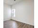 This bedroom has neutral walls, base molding, and new floors at 9421 Wisdom Valley Ave, Las Vegas, NV 89149