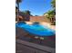 Swimming pool featuring tile waterfall and patio at 9421 Wisdom Valley Ave, Las Vegas, NV 89149