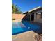 Exterior view of the sparkling blue pool and the patio at 9421 Wisdom Valley Ave, Las Vegas, NV 89149