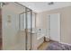 Bathroom featuring a separate shower and tub, with tile surround and modern glass enclosure at 953 Via Del Tramonto St, Henderson, NV 89011