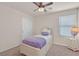 Bedroom featuring neutral paint, a twin bed and ceiling fan with plenty of natural light at 953 Via Del Tramonto St, Henderson, NV 89011