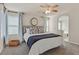 Serene bedroom retreat with soft lighting and ensuite bathroom with a view of the bathtub at 953 Via Del Tramonto St, Henderson, NV 89011