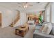 Spacious living room with a combined kitchen and dining area, perfect for modern living at 953 Via Del Tramonto St, Henderson, NV 89011