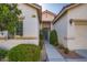 Welcoming front entrance with a well-manicured walkway and desert-friendly plants at , Las Vegas, NV 89149