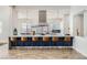 Open concept kitchen with a large island, pendant lighting, and modern bar stools at , Las Vegas, NV 89149