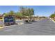 View of a gated entrance into the Edgefield community with decorative signage and landscaping at 10181 Mount Harlow Ct, Las Vegas, NV 89141