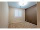 Tan bedroom with carpet and shuttered windows at 10404 Mystic Pine Rd, Las Vegas, NV 89135