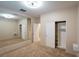 Neutral bedroom features a large mirror, plush carpeting, and ample closet space at 10404 Mystic Pine Rd, Las Vegas, NV 89135