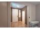 Inviting entryway with tile flooring, a white front door, and neutral wall color, creating a warm welcome at 10404 Mystic Pine Rd, Las Vegas, NV 89135