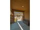 Welcoming front porch featuring stone columns and a bench, offering a cozy outdoor seating area at 10404 Mystic Pine Rd, Las Vegas, NV 89135