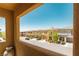 Neighborhood view with multiple homes, well-maintained lawns, and a clear blue sky at 10404 Mystic Pine Rd, Las Vegas, NV 89135