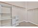 Organized walk-in closet with built-in shelving and ample storage at 10673 Bonchester Hill St, Las Vegas, NV 89141