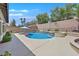 Backyard pool with patio space and lounge area, great for entertaining at 10673 Bonchester Hill St, Las Vegas, NV 89141