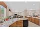 Open kitchen overlooks the living area, creating a spacious and inviting atmosphere at 10701 Morning Harbor Ave, Las Vegas, NV 89129