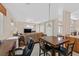 View of living room features comfortable seating, a fireplace, and lots of natural light at 10701 Morning Harbor Ave, Las Vegas, NV 89129