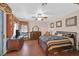 Main bedroom boasts natural light, hardwood floors, and a neutral color palette at 10701 Morning Harbor Ave, Las Vegas, NV 89129