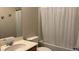 Clean bathroom with shower and tub combo, single sink, and toilet at 10804 Mason Hill Ave, Las Vegas, NV 89166