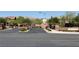 Street view of Manchester and Providence Park entrance with landscaped median and mountain views at 10804 Mason Hill Ave, Las Vegas, NV 89166