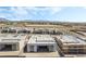 Aerial view of new homes with modern design, and desert landscaping at 10919 Vista Altura Ave, Las Vegas, NV 89135