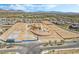 New home construction site featuring a pool, a structure under construction, and pre-built modules at 10919 Vista Altura Ave, Las Vegas, NV 89135