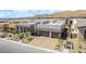 Modern two-story home with a brick driveway and desert landscaping at 10919 Vista Altura Ave, Las Vegas, NV 89135