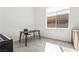 Bright office space featuring a desk and large window, perfect for a productive work environment at 10919 Vista Altura Ave, Las Vegas, NV 89135