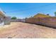 Backyard with wood fence and block wall for privacy at 1121 W Monroe Ave, Las Vegas, NV 89106