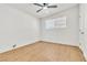 Bedroom with ceiling fan, light wood floor and angled ceiling feature at 1121 W Monroe Ave, Las Vegas, NV 89106
