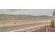 Backyard desert landscape view with mountains and cloudy sky at 1135 Paradise Mountain Trl, Henderson, NV 89002