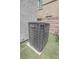 HVAC unit in the backyard with artificial grass at 1135 Paradise Mountain Trl, Henderson, NV 89002