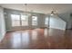 Living room with lots of natural light, hardwood floors, and a chandelier at 1135 Paradise Mountain Trl, Henderson, NV 89002