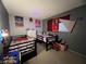 Bedroom featuring two twin beds and neutral-colored walls at 1152 Miller Ave, Las Vegas, NV 89106