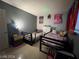 bedroom features two twin beds and colorful decor at 1152 Miller Ave, Las Vegas, NV 89106