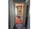 A hallway view showing a room at the end at 1507 Elizabeth Ave # 1, Las Vegas, NV 89119