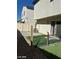 This backyard is fully fenced with gravel and turf at 1891 Via Del Prado St, Las Vegas, NV 89115