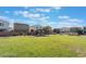 This photo shows the community park area with a pergola, trees and grass at 1891 Via Del Prado St, Las Vegas, NV 89115