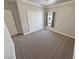 Comfortable bedroom with neutral carpet, a window, and closet at 210 Magnolia Blvd, Pahrump, NV 89048