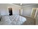 Bright primary bedroom featuring plush carpet, ensuite bathroom and closet provides privacy and convenience at 210 Magnolia Blvd, Pahrump, NV 89048