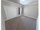 Comfortable carpeted bedroom with a closet at 210 Magnolia Blvd, Pahrump, NV 89048