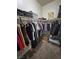 Walk-in closet with ample hanging and shelf space to accommodate clothing and accessories neatly at 210 Magnolia Blvd, Pahrump, NV 89048