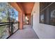 Private balcony with black iron railings and stucco walls at 23 E Agate Ave # 308, Las Vegas, NV 89123